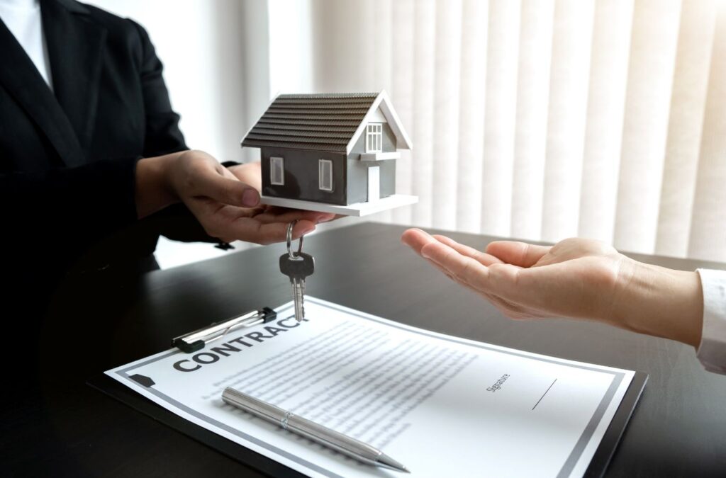 Scotty Cash Buys Houses agent finalizing a contract with a homeowner in Sherwood, AR, demonstrating trust and professionalism in cash home buying services. Cash Home Buyers near me.